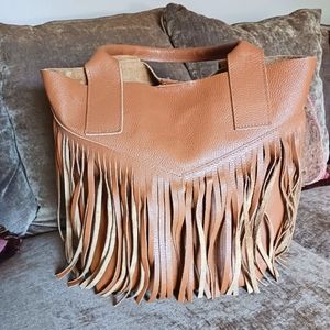 Vera Pelle genuine Italian pebble leather tote with fringes.